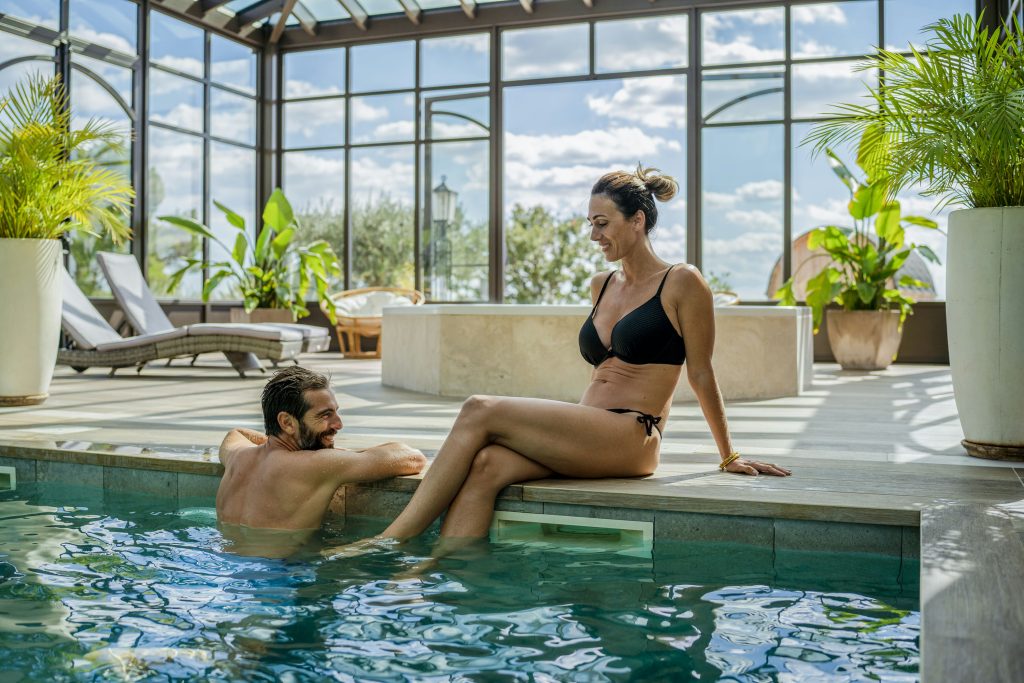 A couple swimming in the outdoor pool - hotel in the Var