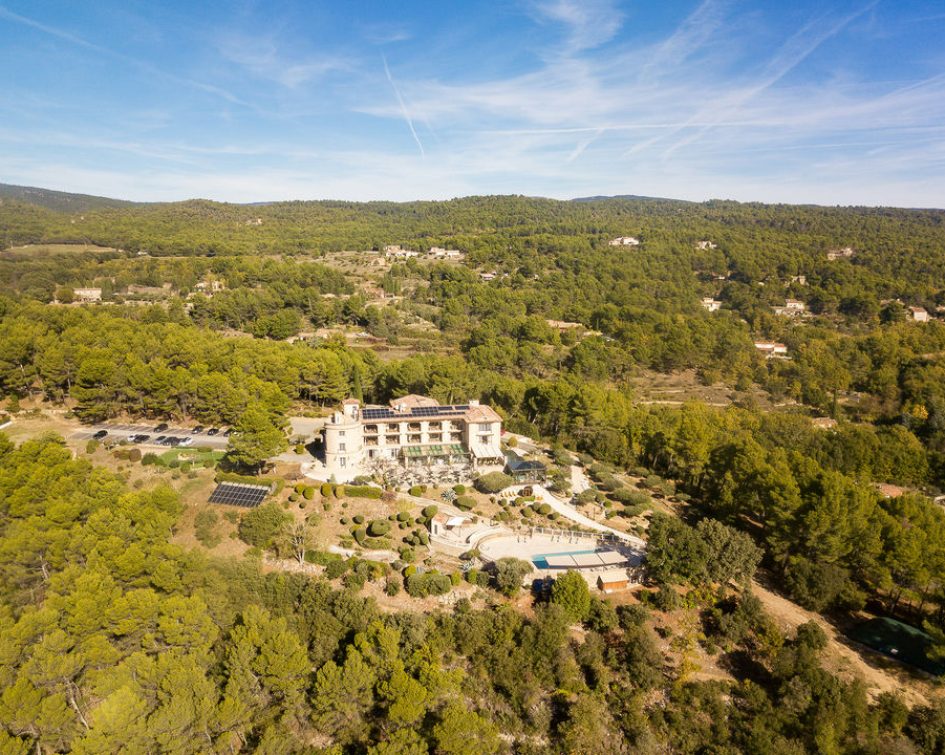 Aerial view of the Bastide de Tourtour with visible solar panels