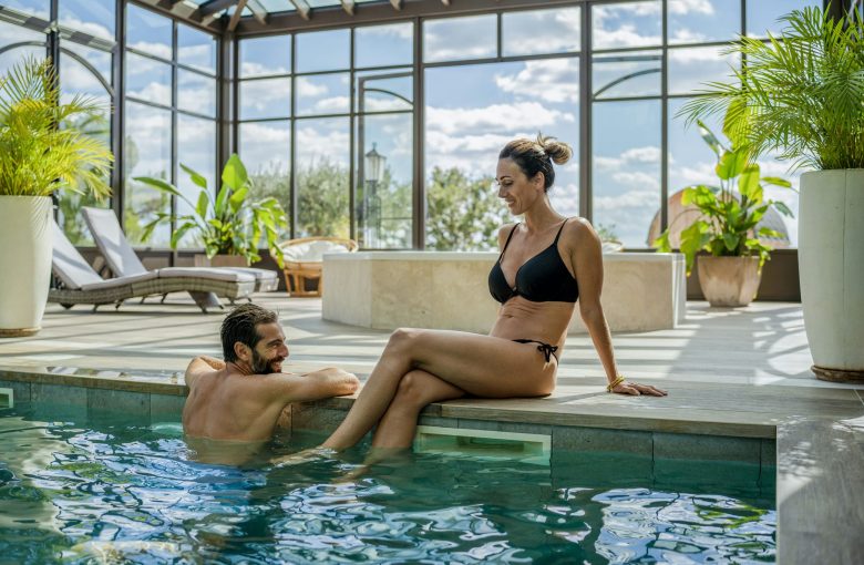 A couple swimming in the outdoor pool - hotel in the Var