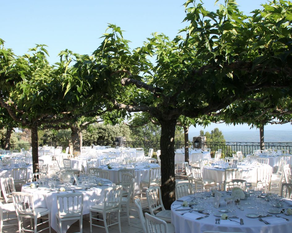Decorated outdoor tables for a wedding at the Bastide de Tourtour