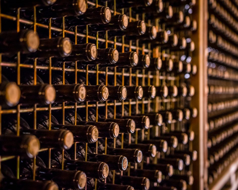 Wine bootles from cellar in selective focus