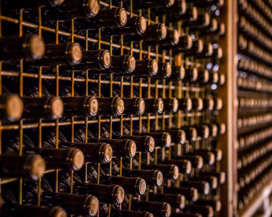 Wine bootles in a cellar Wine bootles from cellar in selective focus